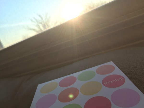 thank you card in the rays of the sunrise